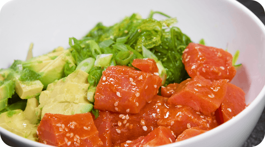 spicy tuna poke in white bowl