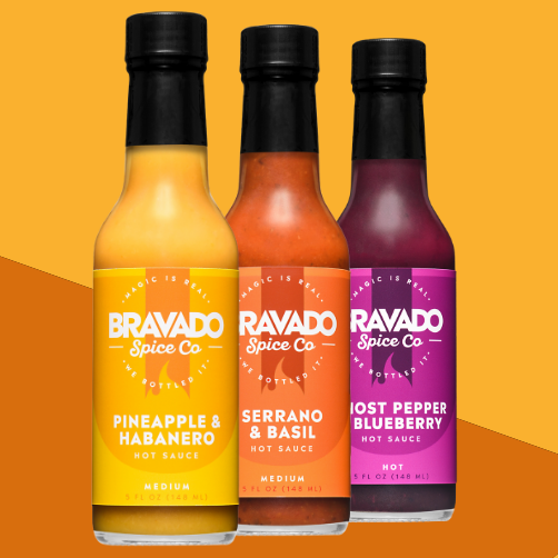 Bravado Spice Co hot sauce trio: Pineapple & Habanero "Medium," Serrano & Basil "Medium," and Ghost Pepper & Blueberry "Hot" sauces.